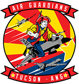 Patch design featuring "Air Guardians" and "Tucson - ANG" text. Shows a character riding a jet against a backdrop of red and yellow stripes with additional jets in flight.